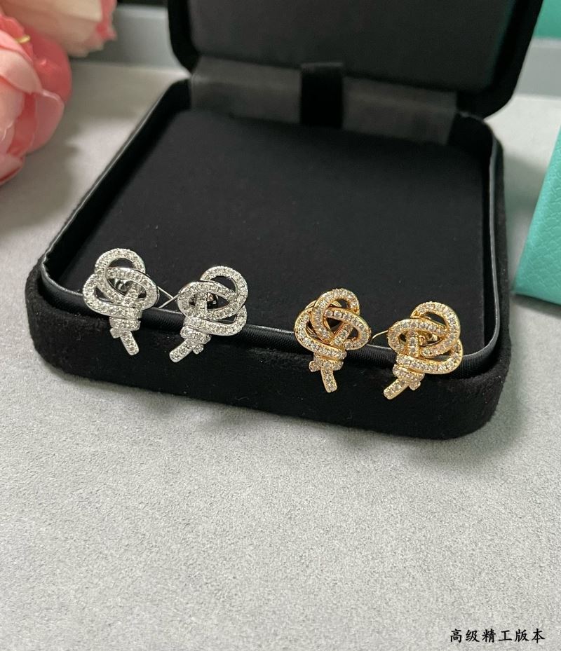 T*f*ny earrings